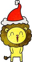 laughing lion textured cartoon of a wearing santa hat vector