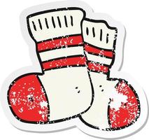 retro distressed sticker of a cartoon socks vector