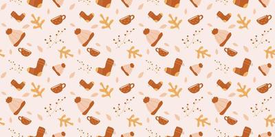Seamless pattern with caps, socks, cups and leaves in orange, beige, brown and yellow. Ideal for wallpaper, gift paper, pattern fills, web page background, fall greeting cards.