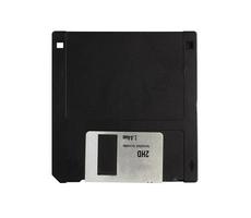 Black 3.5 floppy disk on a isolate white background.Computer devices in the '90s for recording data.top-down,front view,top view,flat lay. photo