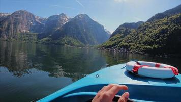 Hallstatt Lake and mountains from view of boat video