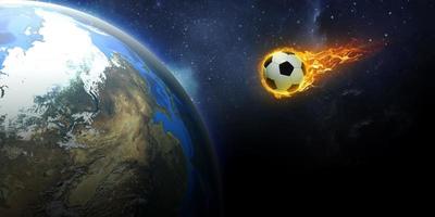 una pelota de fútbol ardiente que estalla con velocidad choca con el planeta tierra foto