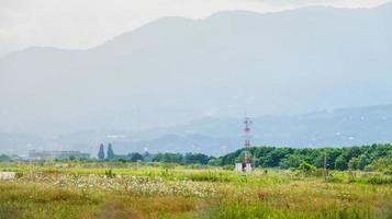 Batumi airport runway special system with sounds of various birds species to chase-off birds protect runway and airplanes from accidents photo