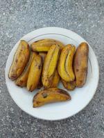 Close-up of boiled banana, a simple traditional Indonesian dish used as a snack. Food with many health benefits. Used for background and advertisement. photo