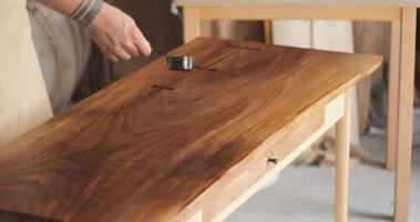 Master carpenter, Applying natural oil on natural wood table. part 1 video