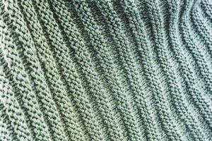 Detailed close up view on samples of cloth and fabrics in different colors found at a fabrics market photo