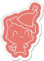 pegatina de dibujos animados de un gato feliz con sombrero de santa vector