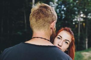 guy hugging his girlfriend photo