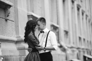 European beautiful couple posing on the street photo