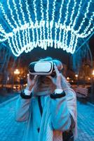 Young girl getting experience VR headset photo