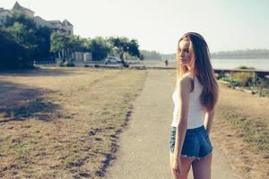 young beautiful girl posing photo