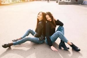 Two young adult girls photo