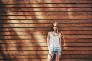 beautiful girl poses for camera photo