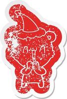 happy bear cartoon distressed sticker of a wearing santa hat vector