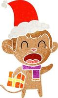 shouting retro cartoon of a monkey carrying christmas gift wearing santa hat vector