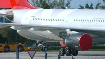 MOSCOW, RUSSIAN FEDERATION SEPTEMBER 12, 2020 - NordWind Airlines Airbus 330 being towed for maintainance. Sheremetyevo International airport, SVO UUEE video