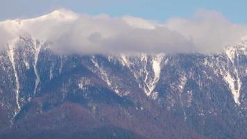 Thick clouds swirling over a mountain range slopes near Black Sea coast. Caucasus, Russia. Time lapse. video