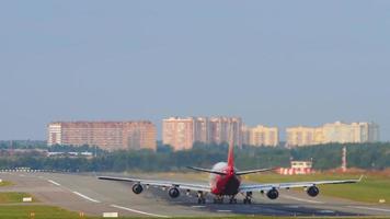 Widebody airplane accelerate for take off from International airport of Moscow. video