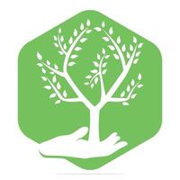 árbol en el diseño del logotipo del vector de la mano. logotipo de productos naturales. icono de cosméticos. logotipo de balneario.