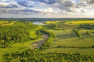 Aerial view from drone of beautiful fresh green countryside and at summer photo