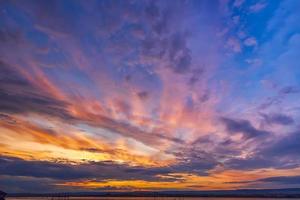 Amazing colorful clouds at the sky. Amazing view on the dramatic sunset sky photo