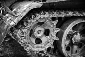 tank caterpillar, iron wheels, tank undercarriage close up, metal wheels photo