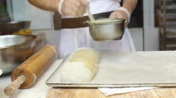 Baker making a delicious stuffed bread video