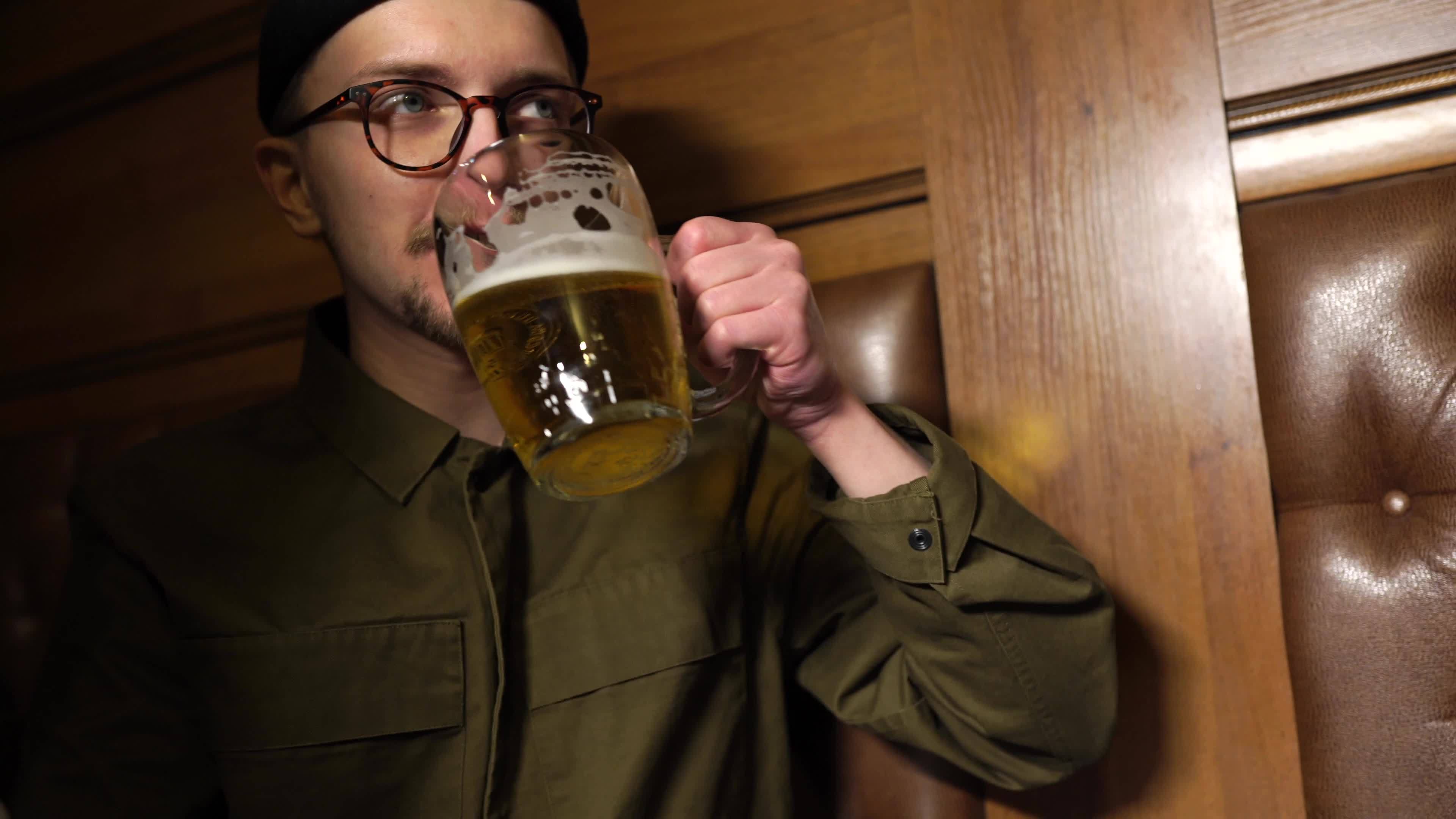 Happy hour at bar, boys drink beer and hangout 11801586 Stock Video at