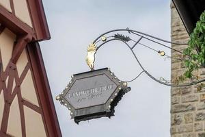 Rothenburg, Germany, 2014. Ornate hanging sign for Landwehr-Brau in Rothenburg photo