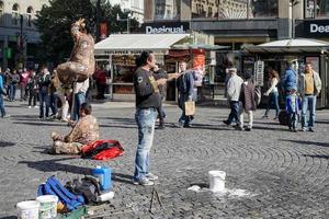 Prague, Czech Republic, 2014. Street performers iat the entrance to  Wenceslas Square in Prague photo