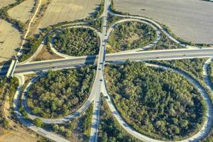 Aerial view from drone of road junction. Transportation and infrastructure concept photo