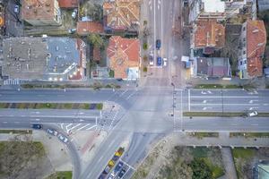 Aerial view from drone of city road junction empty of cars, top view photo