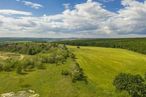 Aerial view from drone of beautiful fresh green countryside and at summer photo