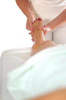 leg and foot massage at the spa and wellness center photo