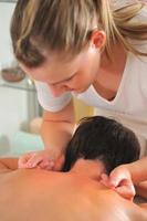 back massage at the spa and wellness center photo