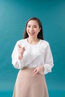 Asian woman pointing side photo