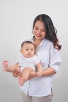 portrait of young asian family relaxing photo