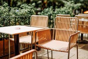 Set of table and chairs in coffee shop photo