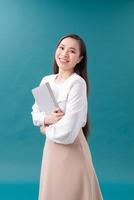 Young happy smiling business womanwith folder, empty copyspace place for slogan or some advertising text message photo