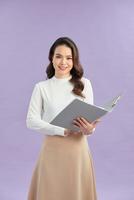 Asian business woman holding open folder with document photo