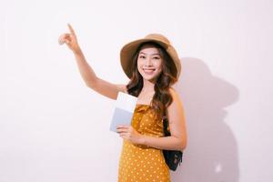 Woman traveler holding passport with ticket. photo