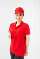 A portrait of Happy Female delivery service showing thumb up photo