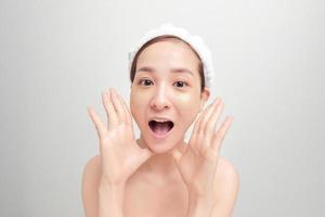 Spa skin care beauty woman wearing hair towel after beauty treatment photo