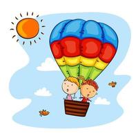 Happy kids riding hot air balloon vector