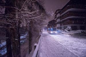 Switzerland, 2022 - Electric taxi bus in the car-free holiday montain resort photo