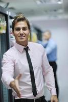 it engineers in network server room photo