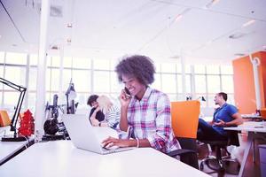 African American informal business woman working in the office photo