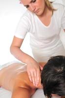 back massage at the spa and wellness center photo