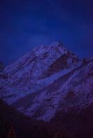 mountain village in alps  at night photo