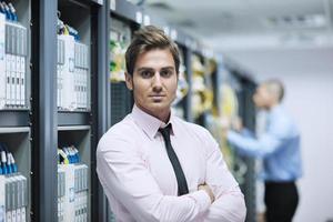 it enineers in network server room photo